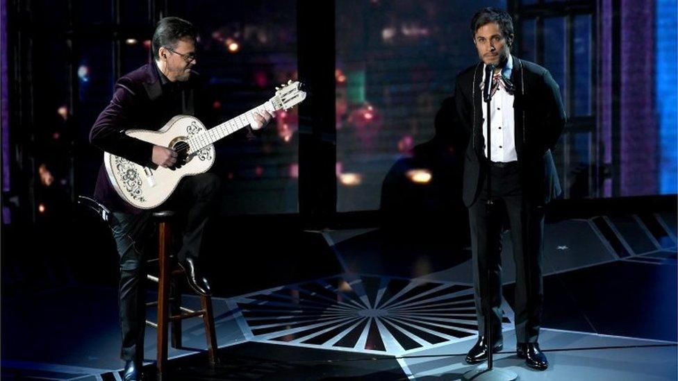 Actor Gael Garcia Bernal (R) performs onstage during the 90th Annual Academy Awards at the Dolby Theatre at Hollywood ^ Highland Center on March 4, 2018 in Hollywood, California.