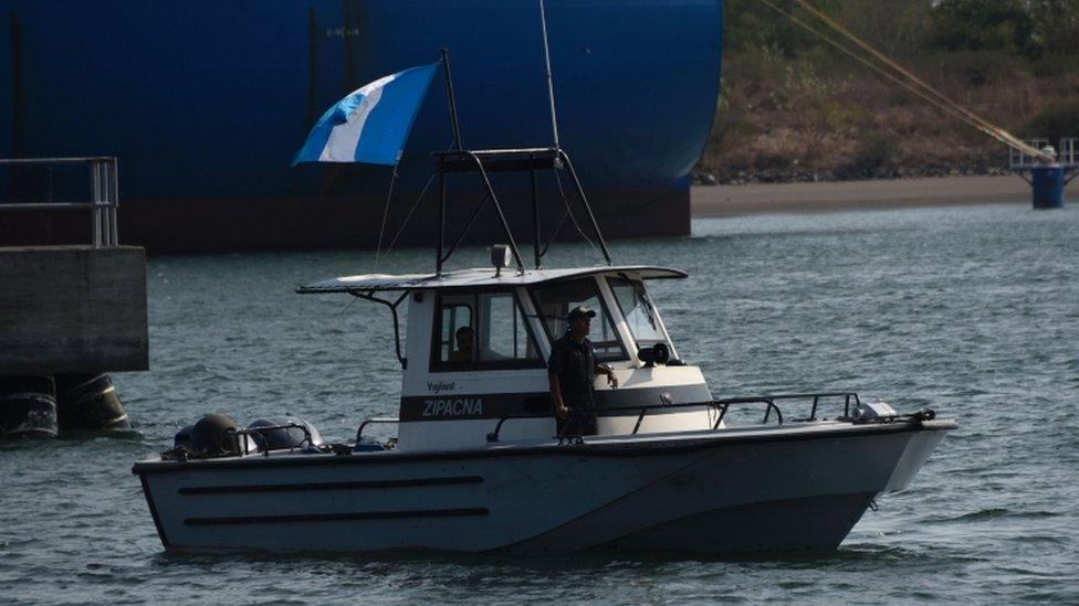 An army boat approaches the "abortion ship" of the Dutch organization Women on Waves