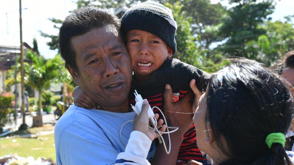 Jumadil with his grandfather