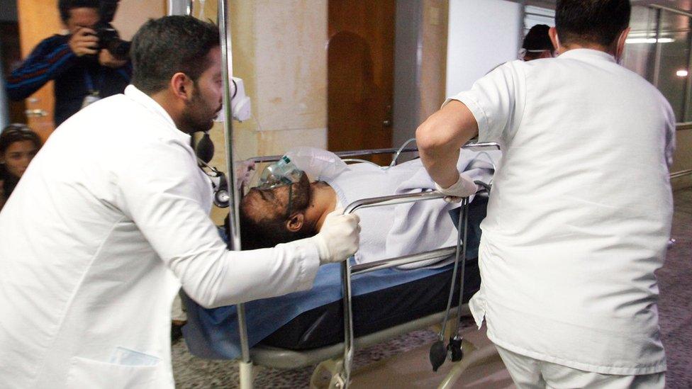 Alan Ruschel, a defender for the Brazilian soccer team Chapecoense, being led into hospital