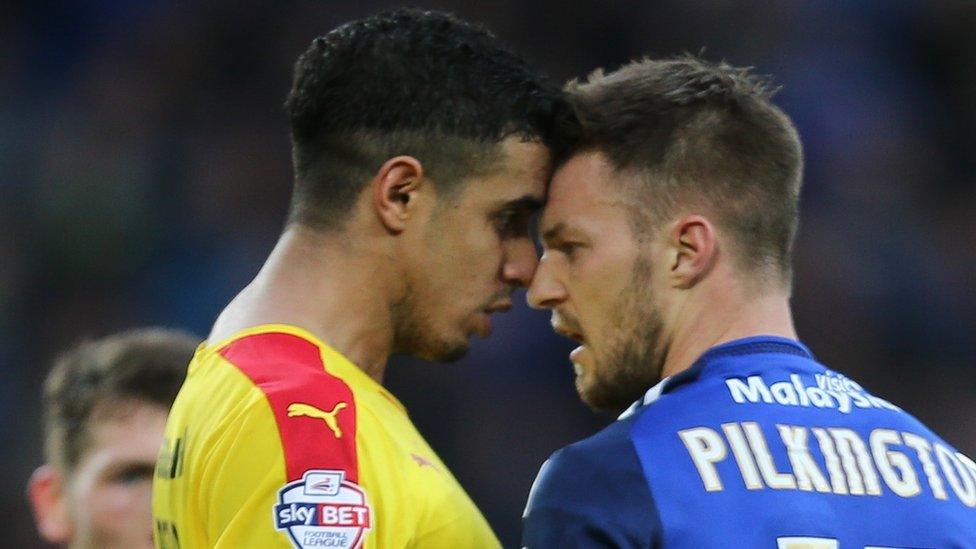 Anthony Pilkington of Cardiff City and Rotherham's Aimen Belaid go face to face