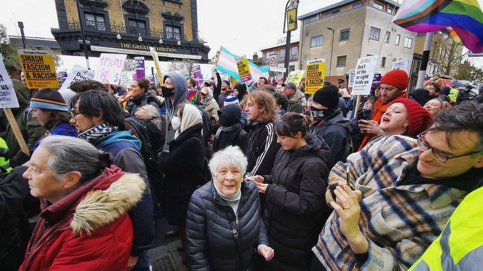 Counter protesters stand outside The Great Exhibition pub in East Dulwich.