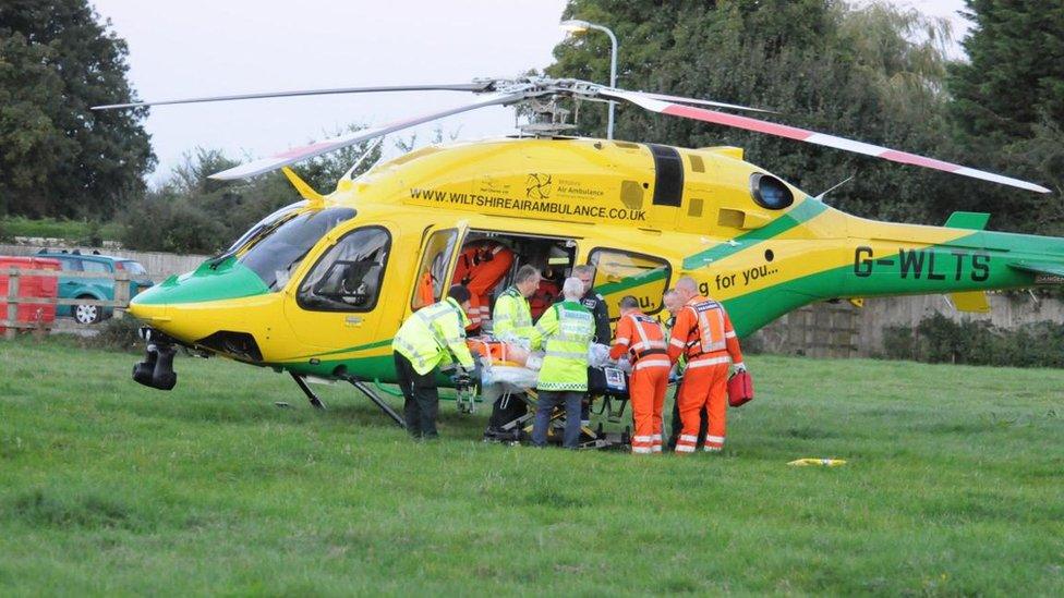 Paramedics place Jeremy into an air ambulance