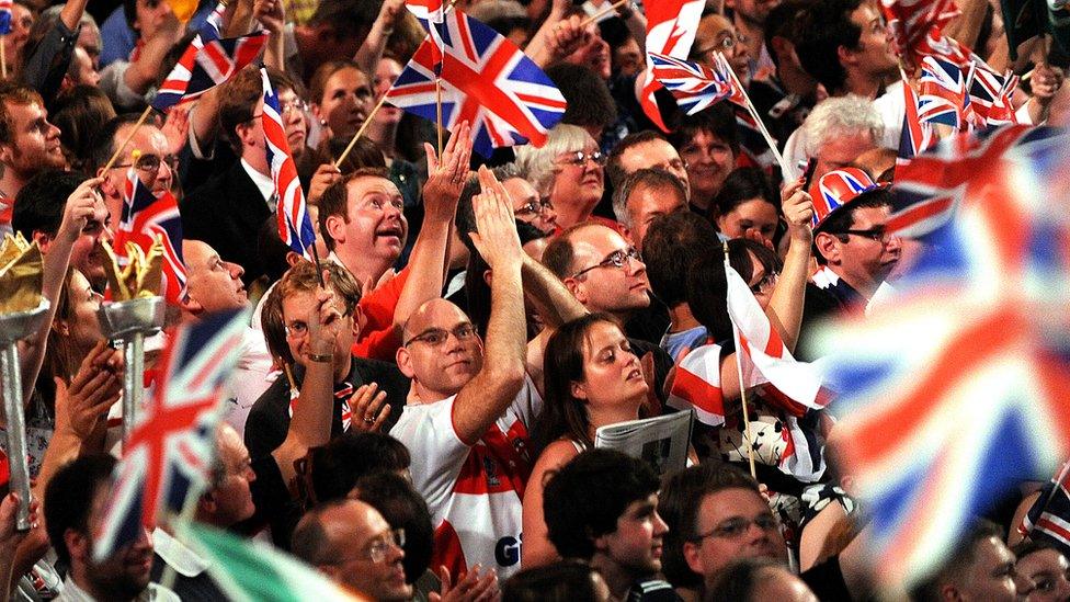 The crowd waves flags at the Last Night of the Proms