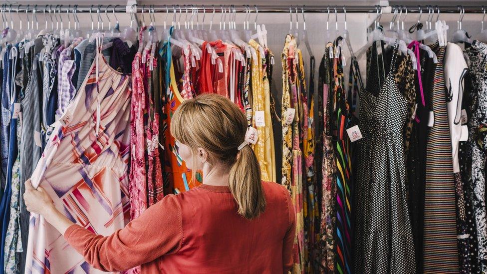 Woman looking at clothes