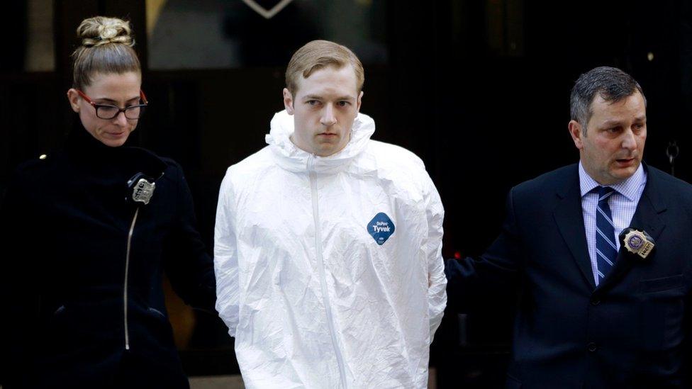 James Harris Jackson is escorted out of a police precinct in New York, Wednesday, March 22, 2017