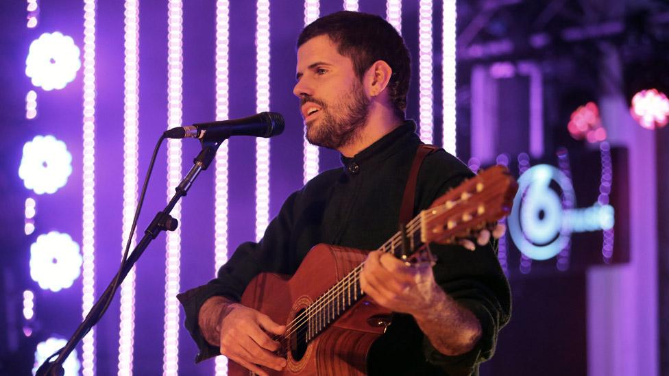 Nick Mulvey on stage in 2014