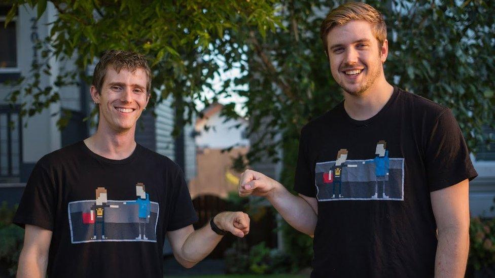 Linus Sebastian and Luke Lafreniere fist bump looking at the camera, wearing matching t-shirts