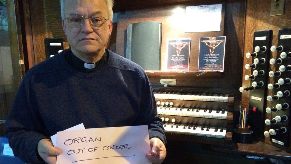 Canon Ian Black and damaged church organ