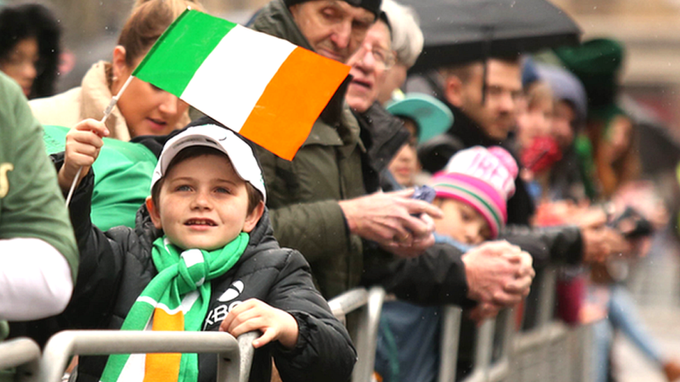 People watch the parade