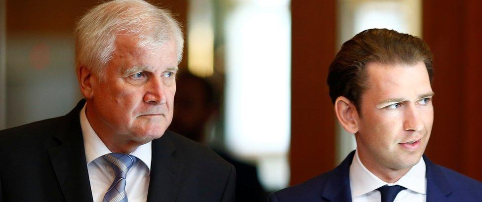 German Interior Minister Horst Seehofer and Austrian chancellor Sebastian Kurz are seen prior to a 13 June news conference in Berlin, Germany