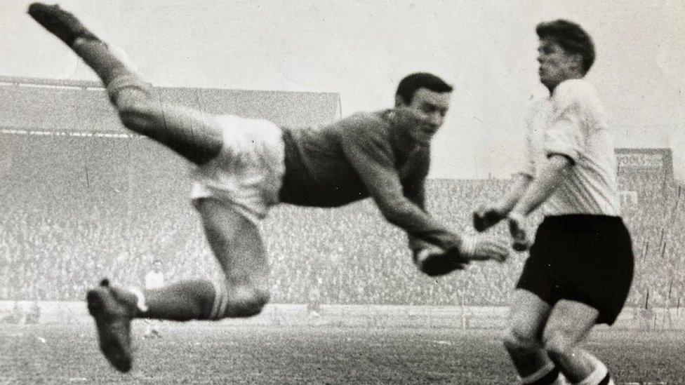 Barry bridges leaping into the air while playing for Chelsea against Huddersfield in 1964