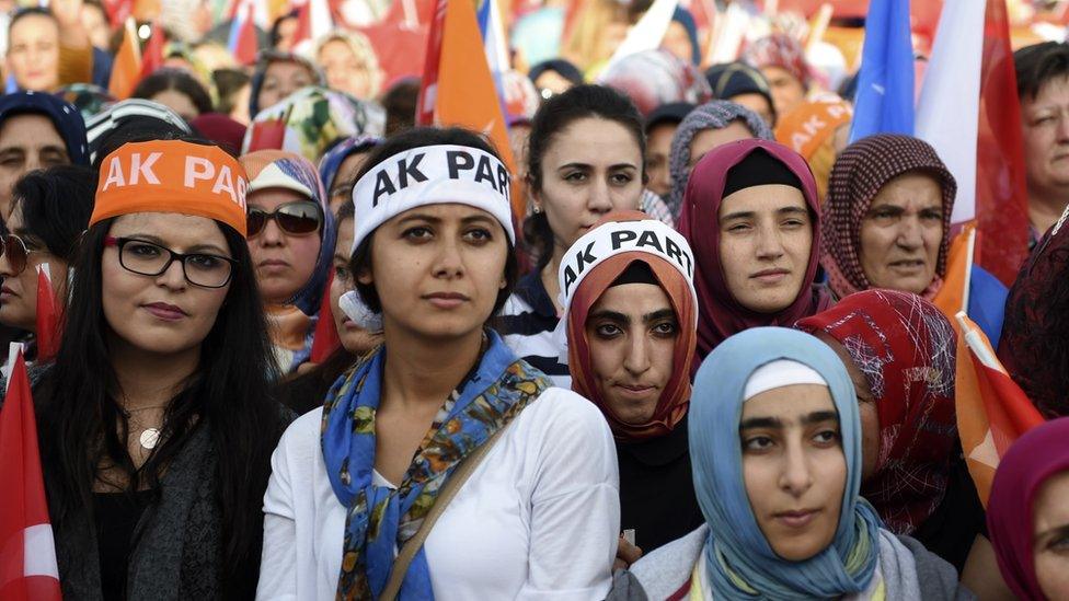 Turkish women attend a rally to support Turkish Prime Minister Ahmet Davutoglu (not pictured) during a mass campaign rally of ruling Justice and Development Party (AKP)