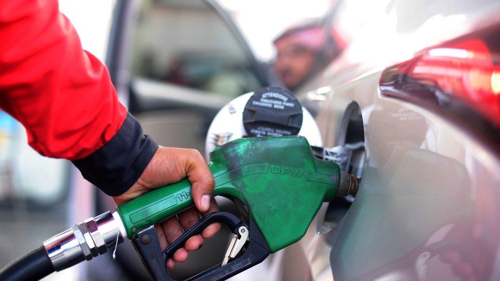 A Saudi motorist refuels his car in Jeddah