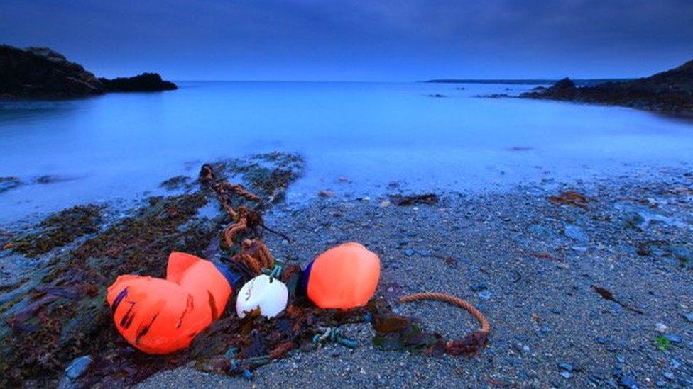 Buoys at Porth Colmon, near Llangwandl on the Llyn Peninsula.