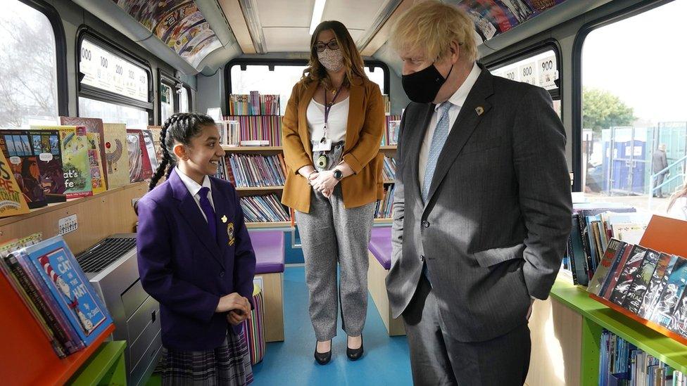 Boris Johnson on a school bus library