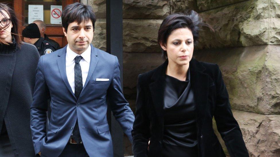 Former Canadian radio host Jian Ghomeshi leaves court with his attorney Marie Henein (R), after an Ontario judge found him not guilty on four sexual assault charges and one count of choking in Toronto, March 24, 2016.