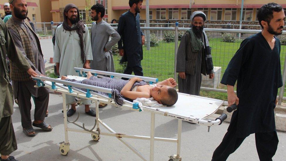 An Afghan child receives treatment at a hospital after Monday's airstrike in Kunduz province, Afghanistan April 3, 2018.