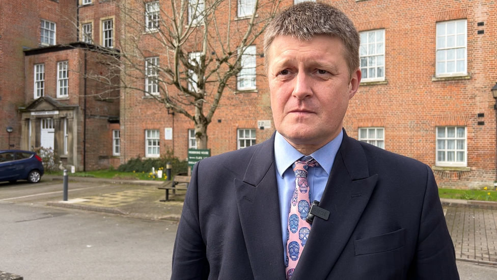 Councillor Richard Clewer outside Pembroke House