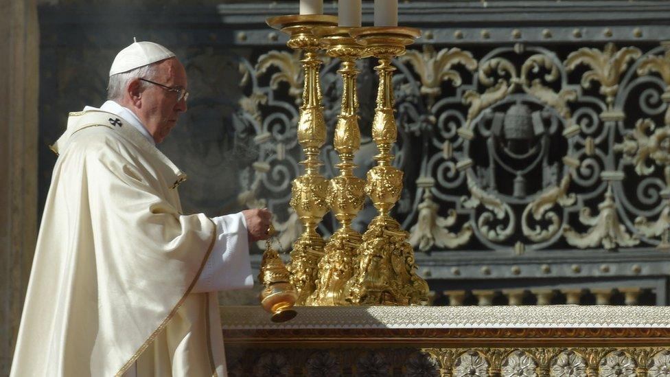 Pope Francis carries out a blessing Saint Peter's Basilica at the Vatican in Rome, 16 October 2016