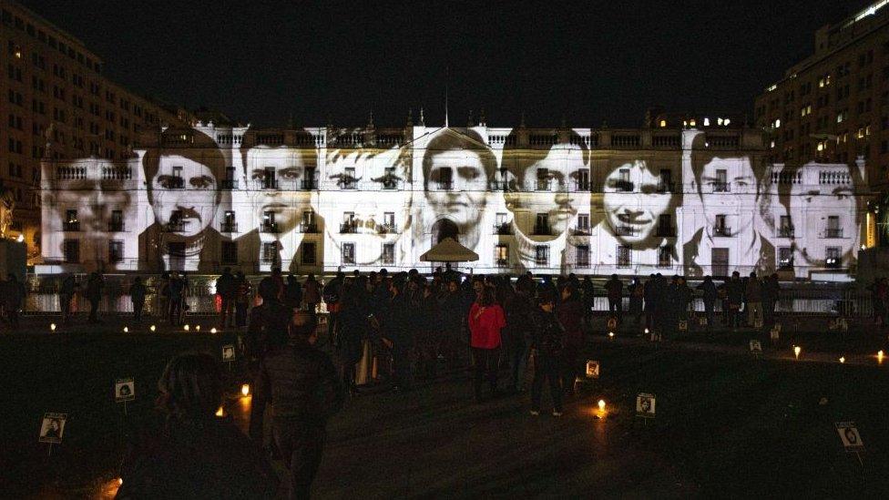 A view of the images portraying victims of the Augusto Pinochet dictatorship projected onto the La Moneda Presidential Palace to mark the commemoration of the International Day of the Disappeared in Santiago, Chile on August 30, 2023.