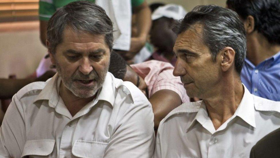 French pilots Pascal Fauret (left) and Bruno Odos attend a court hearing on 27 March 2013