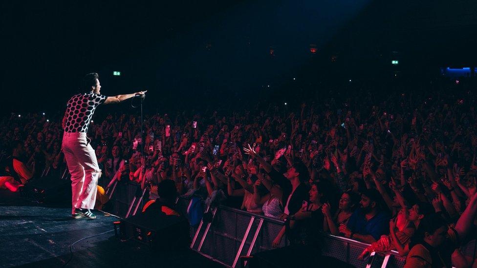 Harry Styles on stage at the Brixton Academy