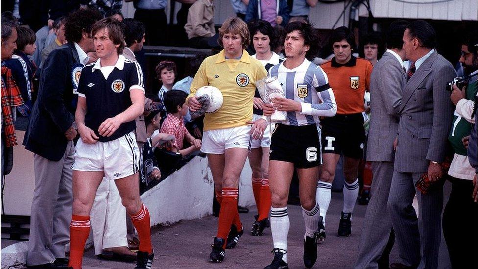 1979 International Football Friendly.Scotland v Argentina.Kenny Dalglish leads out the Scotland team followed by Alan Rough and George Burley.Daniel Passarella leads out the Argentine team.(Photo by Mark Leech/Getty Images)