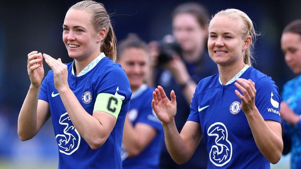 Magdalena Eriksson and Pernille Harder applaud the fans