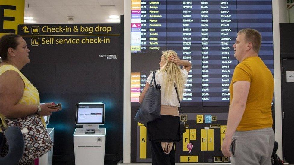 Travellers wait for their flights at Gatwick Airport in London, Britain, 31 May 2022. Holidaymakers across the UK face continuing travel disruptions due to flight cancellations and lack of airport and airline staff during the first school holidays in England and Wales since the lifting of all UK Covid-19 travel restrictions