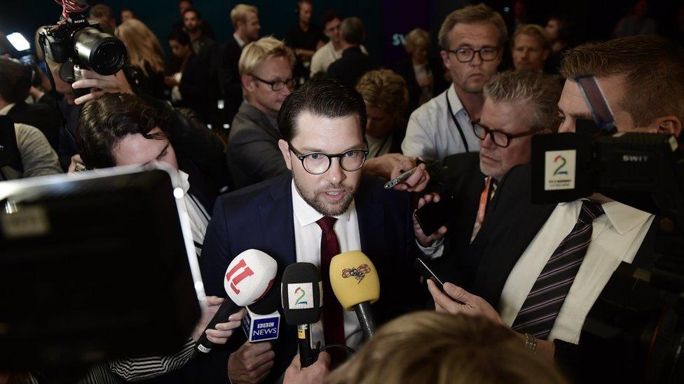 Jimmie Akesson of the Sweden Democrats swarmed with press after a party leader debate on 7 September 2018