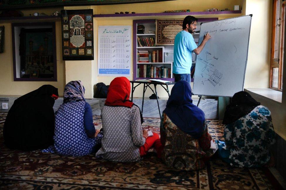 Kashmiris attending alternate classes in Srinagar.