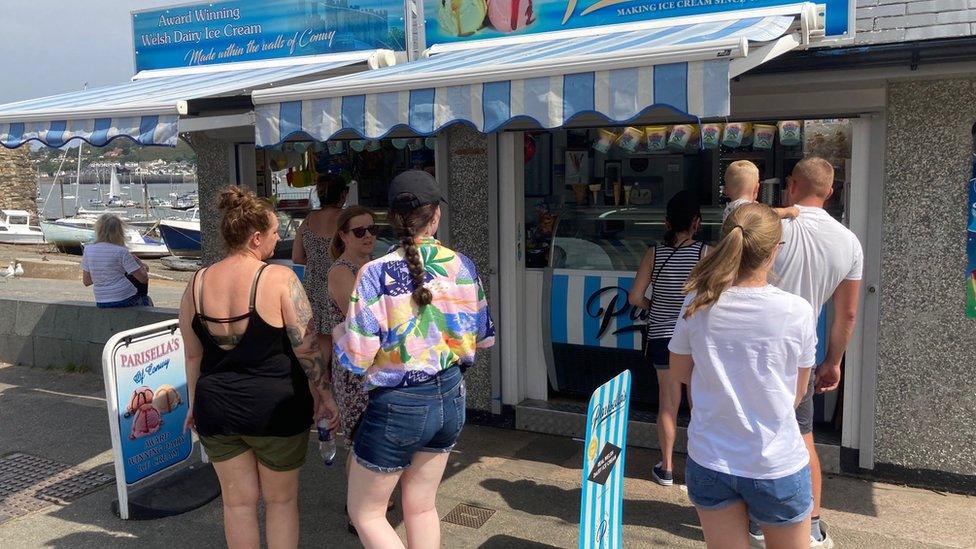 People have been trying to keep out of the sun in Conwy