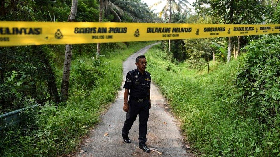 A Malaysian police officer near the Dusun resort