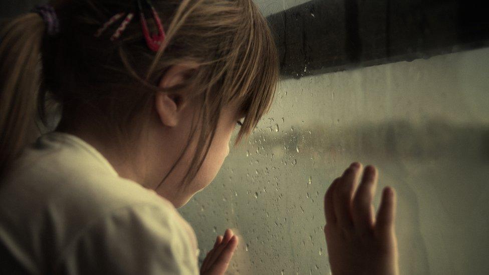 Girl at window