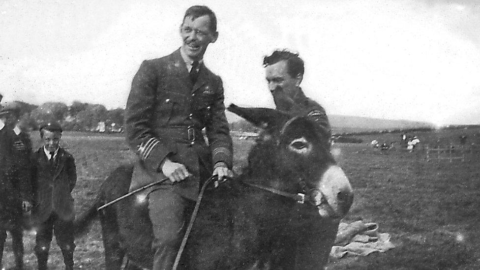 Major D.G. Joy looks rather bemused sitting on this donkey