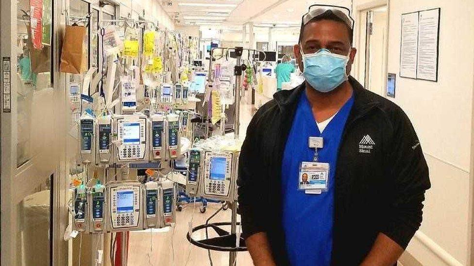 Rocky Walker, wearing a facemask in a Mount Sinai hospital hallway