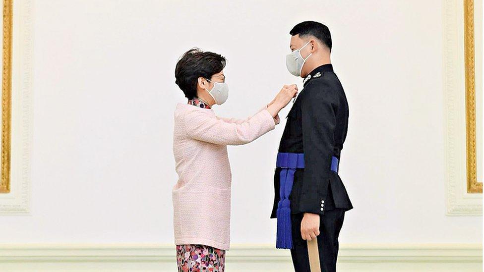 Carrie Lam and Frederic Choi