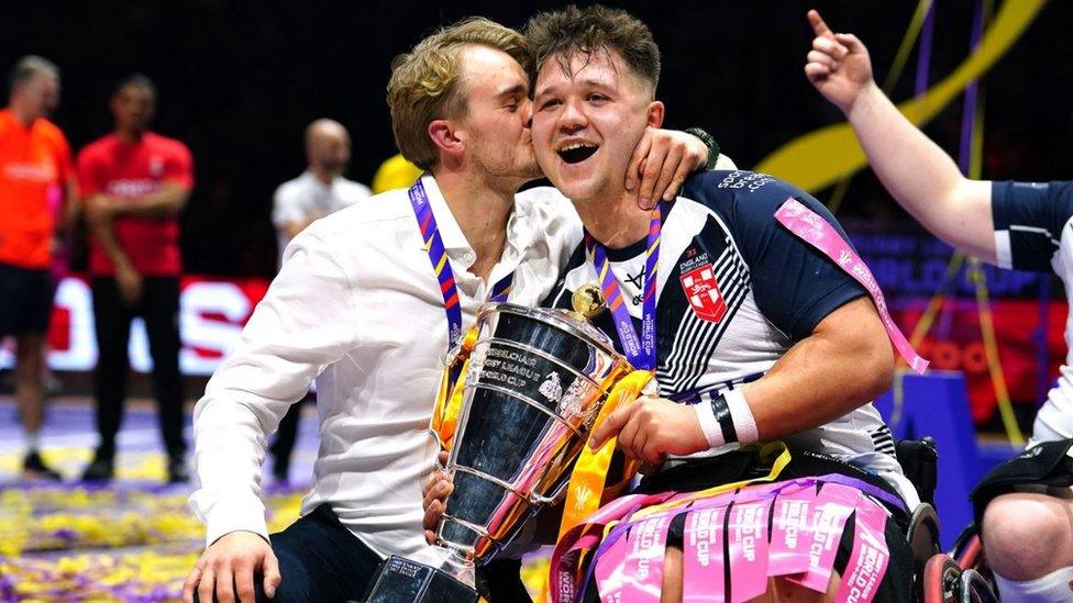 England head coach Tom Coyd (left) and Tom Halliwell celebrate with the trophy