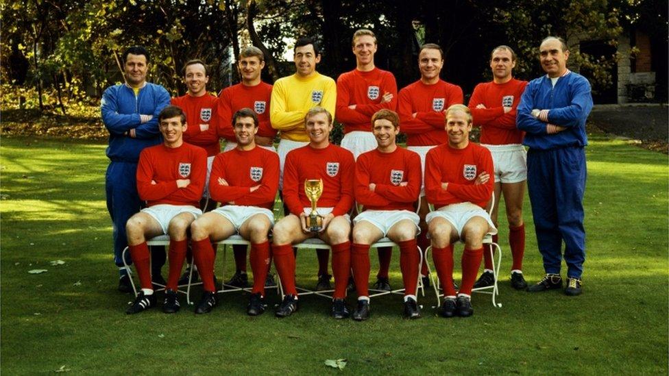 The England Team pose with the Jules Rimet Trophy after winning the World Cup against West Germany at Wembley.