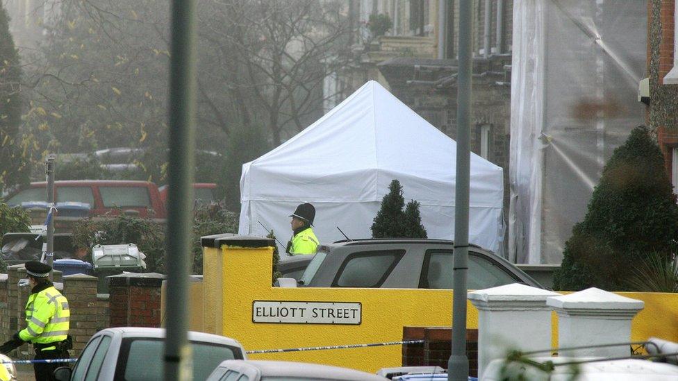 Police outside Wright's house