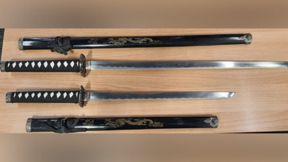 Four sword on a table