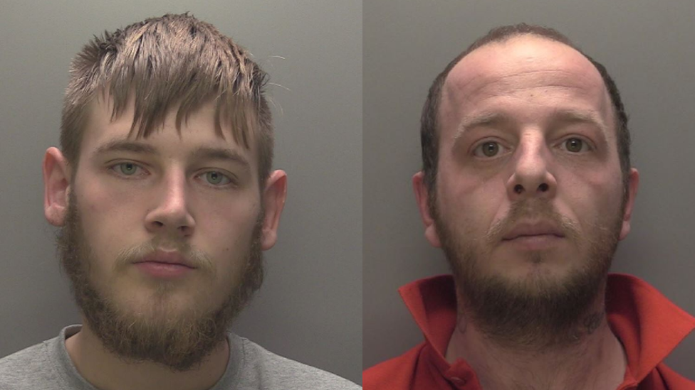 Two custody photos side by side of two men looking into the camera. On the left is a man with brown hair, a brown beard and a brown moustache. He is wearing a grey jumper. The man on the right has short brown hair and a short brown beard and moustache. He is wearing a red shirt and his collar is up