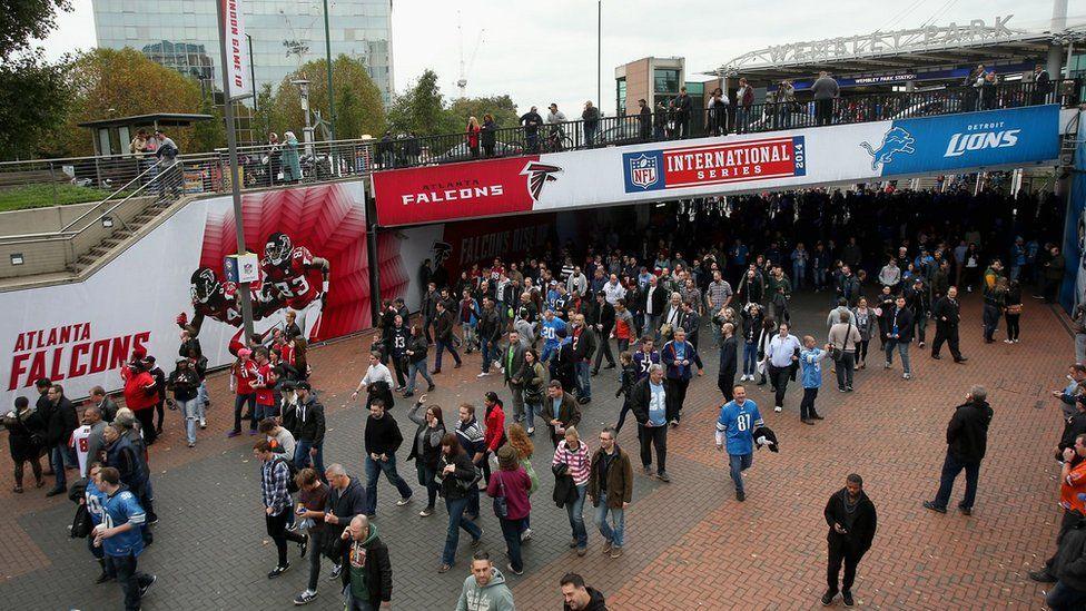 Adverts under the Bobby Moore Bridge and along Olympics Way seen during 2014 NFL match