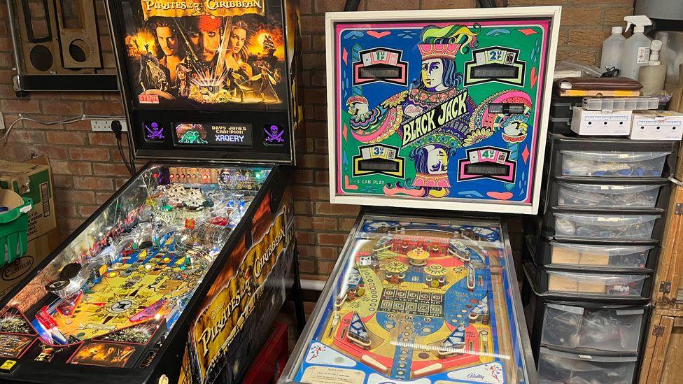 Two colourful pinball arcade games tables – one based on Pirates of the Caribbean and the other on Black Jack