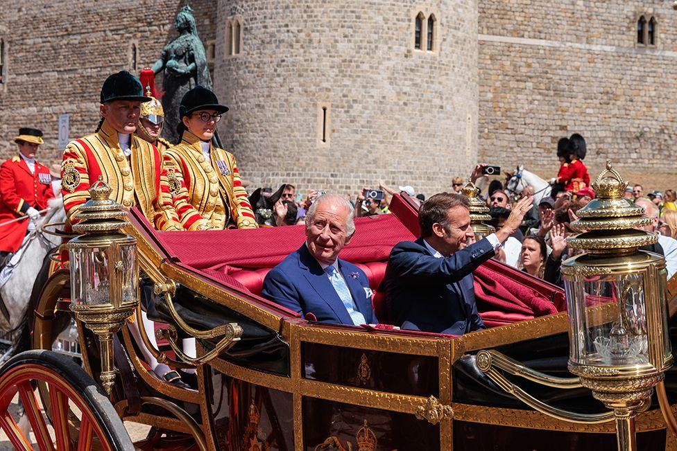 King Charles III and President Emmanuel Macron of France proceed by carriage to Windsor Castle on the first day of the latter's State Visit to the UK on 8th July 2025 in Windsor, United Kingd