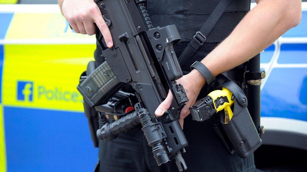 police scotland officer with gun