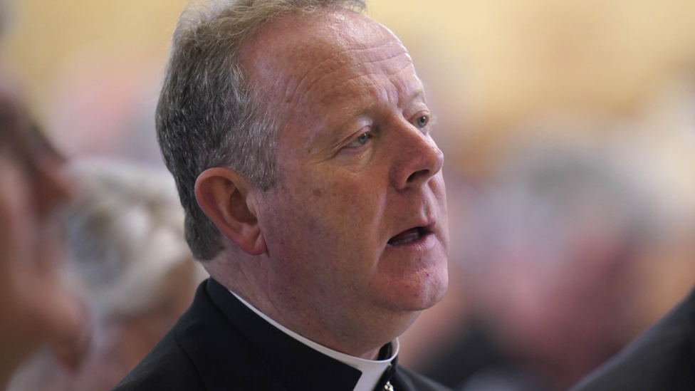 Archbishop of Armagh Eamon Martin wearing black top, with white clerical collar.