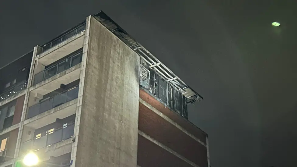 Fire-damaged flats at the top of the Mosaic Apartments building in Slough after the fire had been put out in August 2024.