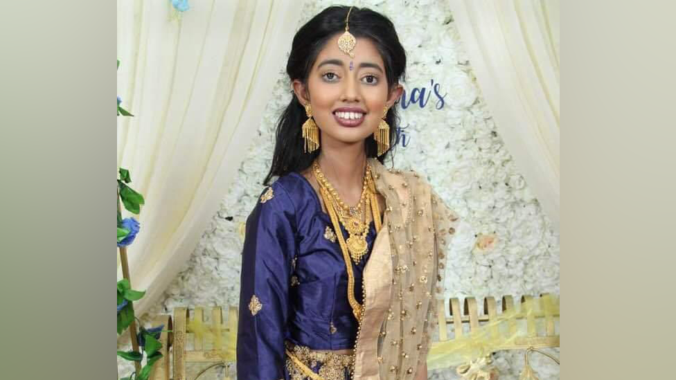 Sudiksha Thirumalesh in a blue dress and gold jewellery